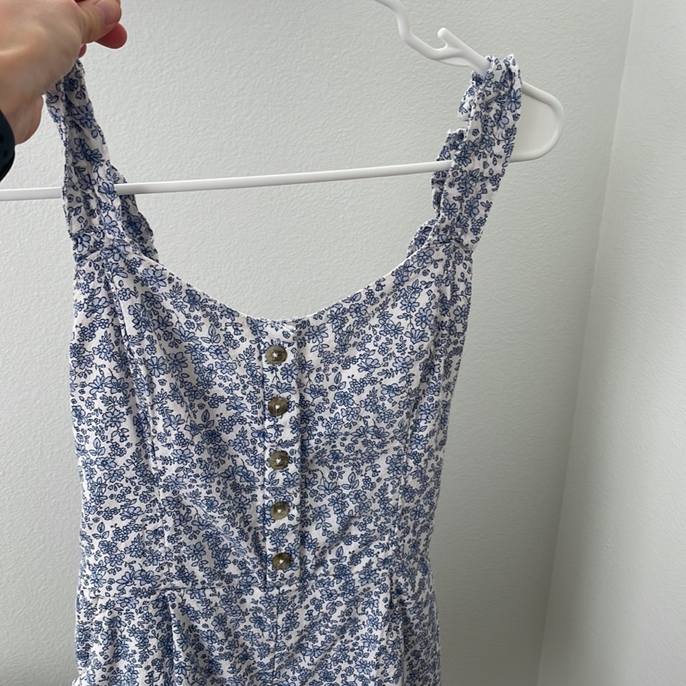 Blue and white floral romper size XS
